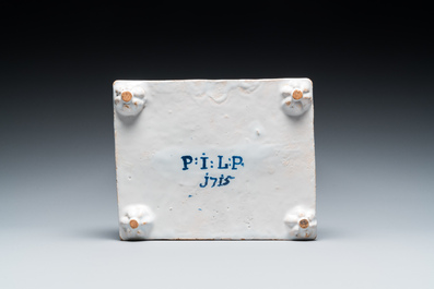 A Delft-style blue and white faience inkwell, probably Germany, signed and dated 1715