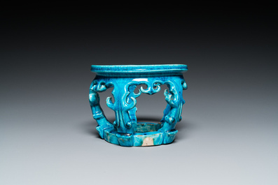 A Chinese monochrome turquoise-glazed reticulated ornament for use in a fish bowl, Kangxi