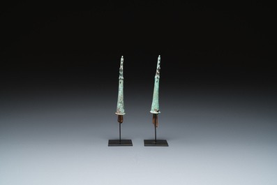 A pair of Chinese bronze finials, Warring States Period, 5th/3rd C. b.C.