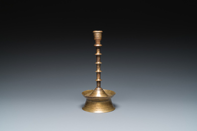 A Dutch or Flemish knotted bronze candlestick, 15/16th C.