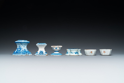 Four blue and white Dutch Delft salts and two small numerically inscribed bowls, 18th C.