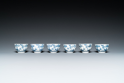 Six blue and white Meissen porcelain cups and saucers, a chocolate pot, a bowl and a tea caddy, 18th C.