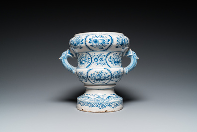 A large blue and white two-handled Frisian Delftware jardini&egrave;re with dolphin handles, Makkum, 18th C.