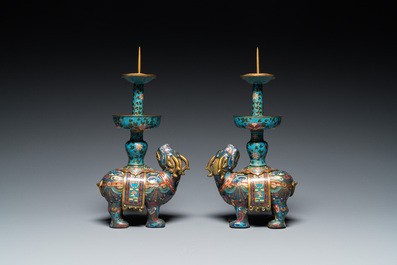 A pair of Chinese cloisonn&eacute; candlesticks in the shape of pixiu, Qing