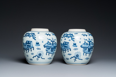 A pair of Chinese blue and white &lsquo;antiquities&rsquo; jars with wooden covers, Kangxi