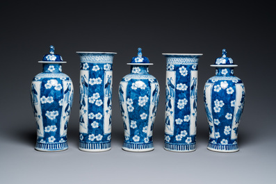A Chinese blue and white garniture of five vases, Kangxi mark, 19th C.