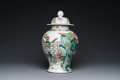 A Chinese famille verte vase and cover, 19th C.