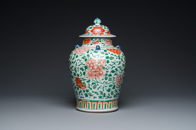 A Chinese 'peony scroll' famille verte vase and cover, Kangxi