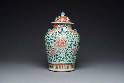 A Chinese 'peony scroll' famille verte vase and cover, Kangxi