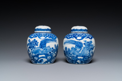 A pair of Chinese Canton famille rose vases and a pair of blue and white covered jars, 19th C.