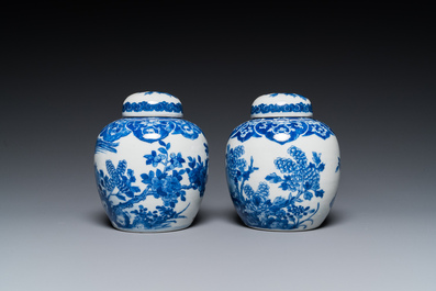 A pair of Chinese Canton famille rose vases and a pair of blue and white covered jars, 19th C.