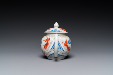 A Chinese iron-red and grisaille 'cranes and carps' teapot and cover, Yongzheng
