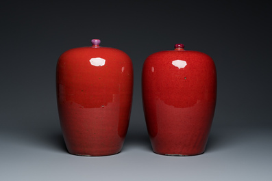 A pair of Chinese sang-de-boeuf-glazed covered jars, 19th C.