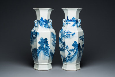 A pair of Chinese blue and white hexagonal 'mountainous landscape' vases, 19th C.