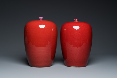 A pair of Chinese sang-de-boeuf-glazed covered jars, 19th C.