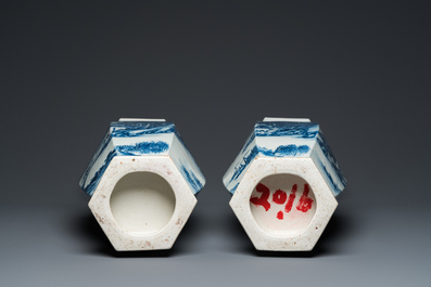 A pair of Chinese blue and white hexagonal 'mountainous landscape' vases, 19th C.