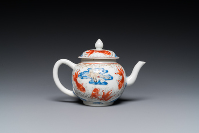 A Chinese iron-red and grisaille 'cranes and carps' teapot and cover, Yongzheng
