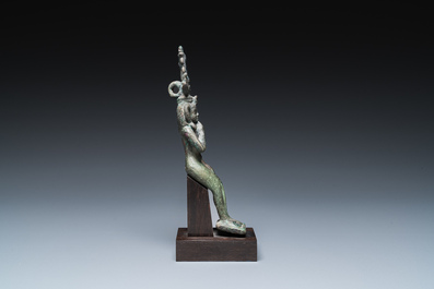 An Egyptian bronze sculpture of Horus, Saite period