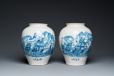 A pair of rare Dutch Delft blue and white 'maritime subject' tobacco jars with brass covers, 18th C.