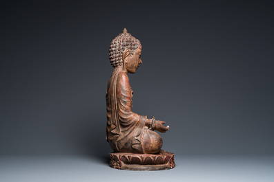 A gilded and lacquered wood sculpture of a praying ascetic, probably Thailand, 18th C.