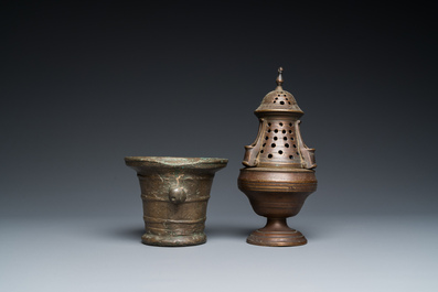 A bronze mortar, a censer and two pax of which one gilded, Western Europe, 16/17th C.