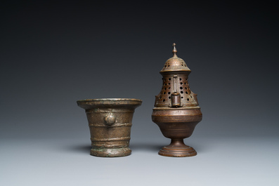 A bronze mortar, a censer and two pax of which one gilded, Western Europe, 16/17th C.