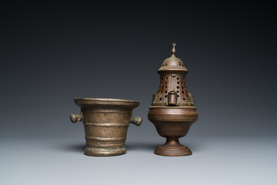 A bronze mortar, a censer and two pax of which one gilded, Western Europe, 16/17th C.