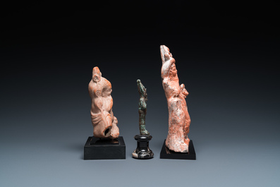 Two Egyptian terracotta sculptures, a bronze sculpture of Osiris and a turquoise frit amulet, Late period and Ptolemaic period