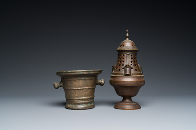 A bronze mortar, a censer and two pax of which one gilded, Western Europe, 16/17th C.