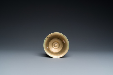 A Flemish brass capstan candlestick, 16th C.
