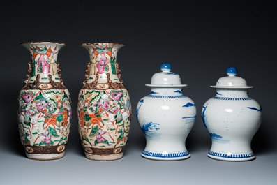 A pair of Chinese blue and white covered vases and a pair of Nanking famille rose vases, 19th C.