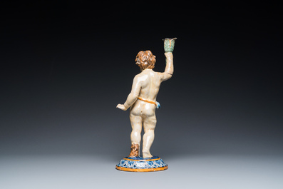 A polychrome pottery sculpture of a standing young man, Spain or France, 18/19th C.