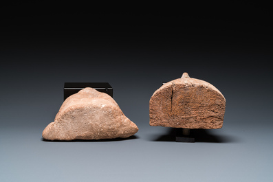 An Egyptian wooden sarcophagus mask and a sandstone head, Late period and Saite period