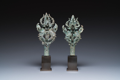 A pair of Khmer bronze ornaments showing dancing Apsaras in Bayon-style, Cambodia, Angkor period, 13th C.