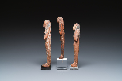 Three Egyptian polychromed wooden ushabtis, New Kingdom