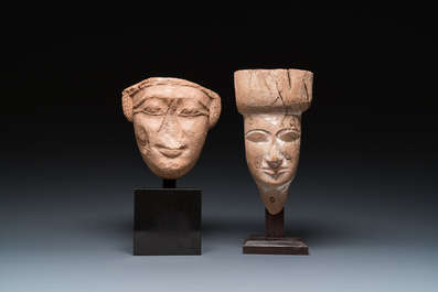An Egyptian wooden sarcophagus mask and a sandstone head, Late period and Saite period