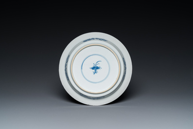 A Chinese blue and white 'two phoenixes and an immortal' plate, Kangxi/Yongzheng