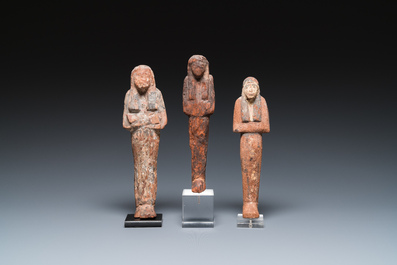 Three Egyptian polychromed wooden ushabtis, New Kingdom