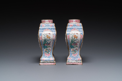 A pair of rare Chinese Canton enamel 'double eagle' vases, Yongzheng