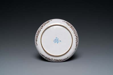 A Chinese Canton enamel 'go-players' plate, Yongzheng/Qianlong