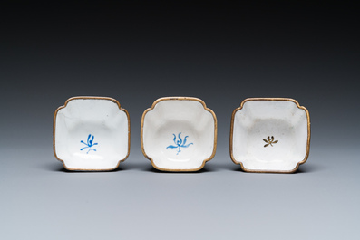 Three Chinese Canton enamel cups and two saucers, Qianlong
