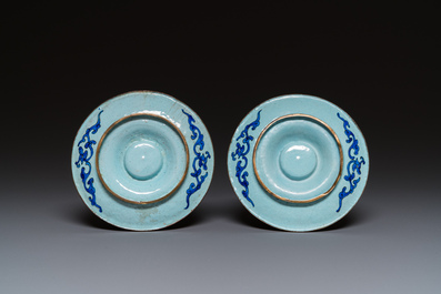 A pair of Chinese Canton enamel trembleuse cups on stands with double 'Shou' design, Qianlong
