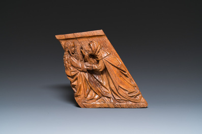 A carved oak retable fragment depicting 'The Annunciation', North-Brabant, 15th C.