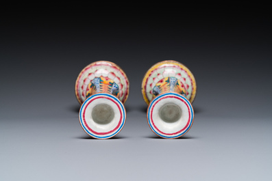 A pair of Chinese Canton enamel 'lotus' candlesticks, Yongzheng