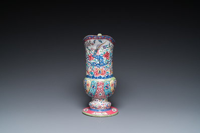 A Chinese Canton enamel helm-shaped ewer with shell-shaped basin, Yongzheng/Qianlong