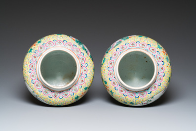 A pair of Chinese famille rose covered vases and a jardini&egrave;re, 19/20th C.