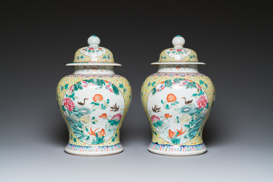 A pair of Chinese famille rose covered vases and a jardini&egrave;re, 19/20th C.