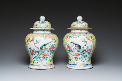 A pair of Chinese famille rose covered vases and a jardini&egrave;re, 19/20th C.