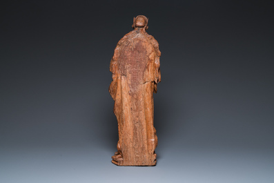 A Flemish carved oak sculpture of a female saint on a pyre, Brabant region, first half 16th C.