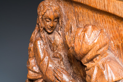 A carved oak retable fragment depicting 'The Annunciation', North-Brabant, 15th C.